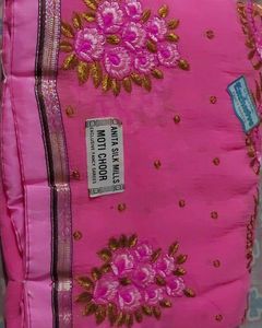 Elegant Pink Saree with Golden Embellishments