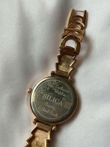 Elegant Rose Gold Watch with Crown Detail