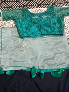 Stunning Teal Saree with Embellished Blouse