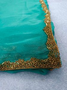 Elegant Teal Saree with Golden Border