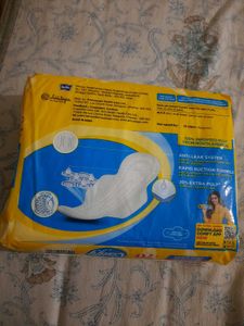 pack of Sanitary Napkins and baby diapers