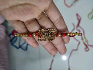veera oxidised gold brooch rakhi