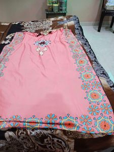 aComfortable Peach Kaftan dress