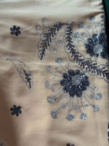 Elegant Peach Embroidered Saree