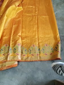 Elegant Orange Silk Saree with Floral Border