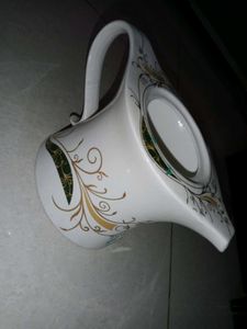 Vintage Gravy Boat with Ornate Design