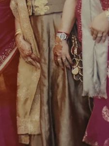 Elegant Brown Lehenga Choli with Gold Embroidery