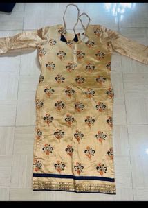 Beautiful Beige Kurta with Blue Tassels