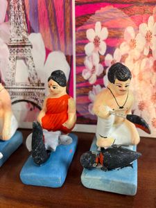Clay dolls for jhulon decoration