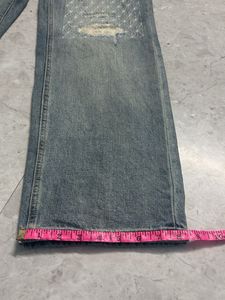 Distressed Patchwork Denim Jeans