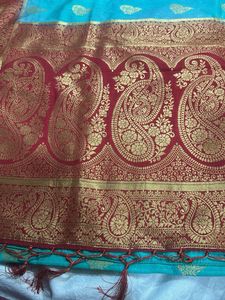 Vibrant Blue Silk Saree with Floral Border red col