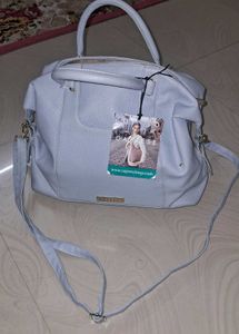 Caprese Peach satchel medium dull blue handbag