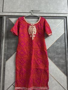 Vibrant Pink Bandhani Kurta with Embellished Neckl