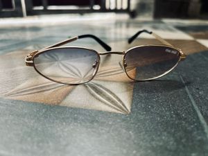 MiuMiu Style Gold Frame Sunglasses