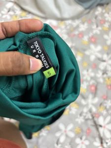 Chic Green Turtleneck Bodysuit
