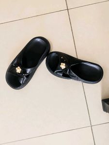 Black Slides with Flower Embellishment
