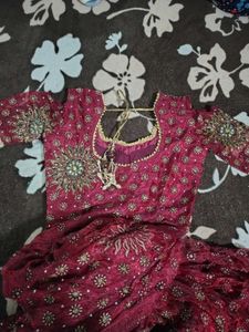 Elegant Mahroon gown with green dupatta