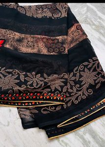 Elegant Black Saree with Floral Print