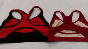 2 Racerback Sports Bras + brown handbag.
