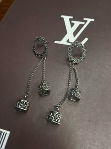 Silver Tone Dangle Earrings