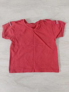 white dungaree with orange tshirt