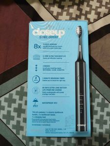 Closeup Sonic Expert Electric Toothbrush