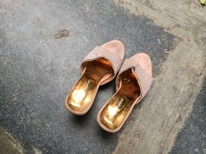 black flats and onion pink heels