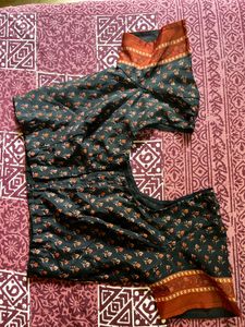 Elegant Black Saree with Orange Border