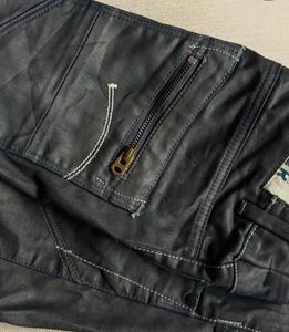 G-Star RAW waxed jeans with leather look finish