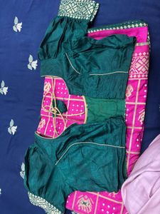 Vibrant Pink Saree with Gold Motifs