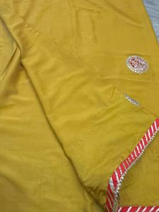 Yellow Saree with Red Embroidered Blouse