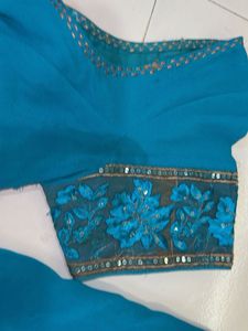 Beautiful Teal Saree with Embellishments
