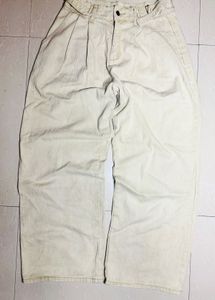 Cream Wide Leg Pleated Jeans