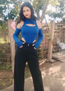 Stylish Blue Cut-out Top with Black Pants