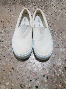 Classic White TOMS Slip-On Shoes