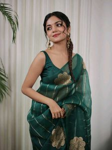 Elegant Green Saree with Floral Motifs