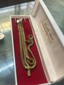 gold snack chain brooch with diamond