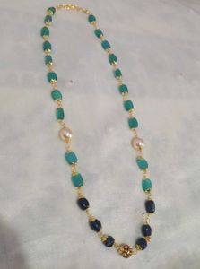 Elegant Beaded Necklace with Pearls