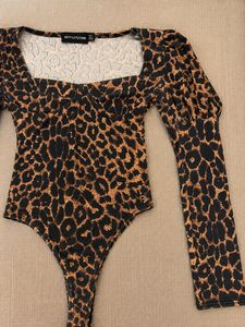 Leopard Print Peplum Long Sleeve Bodysuit