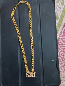 Gold Plated chain with locketof  Name  "SAI"