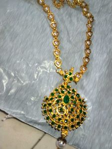Stunning Gold Necklace with Green Stones