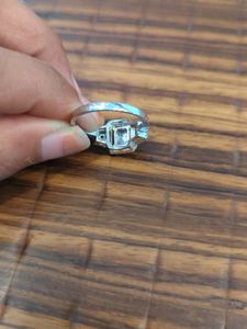 Elegant Emerald Cut Halo Ring