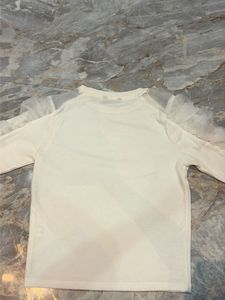 White T-Shirt with Sheer Sleeves