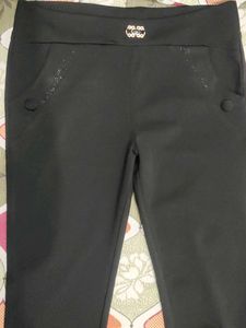 Chic Black Pants/jeggings with Embellished Pockets