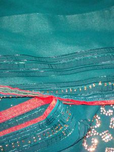 Stunning Embellished Teal Saree