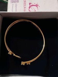 Combo of Silver Jhumka and Gold Bracelet