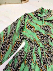 Green Cheetah Print peplum top fits S-M