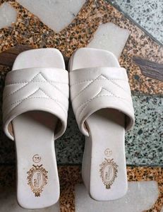 White platform heels