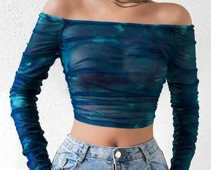 A blue off shoulder crop top