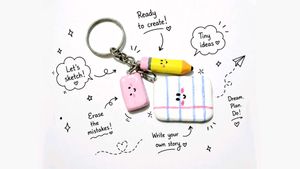 A tiny notebook, pencil and eraser Key chain 📚✏️